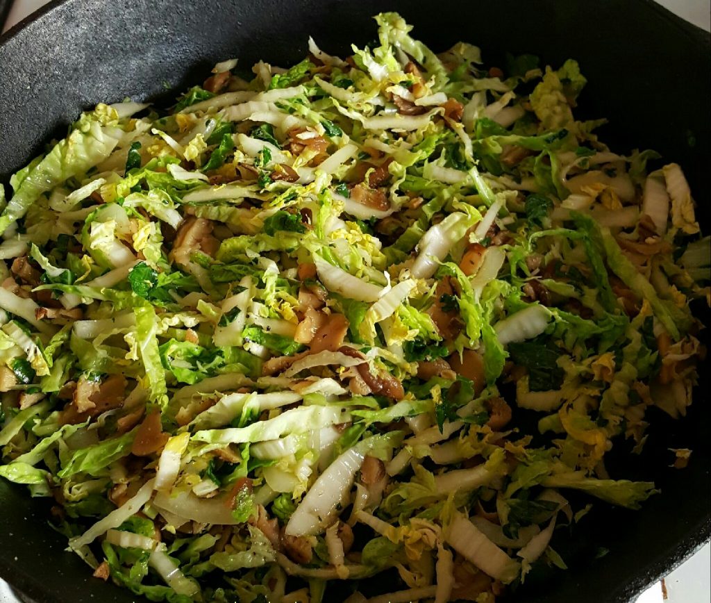 shredded cabbage with mushrooms in a bowl